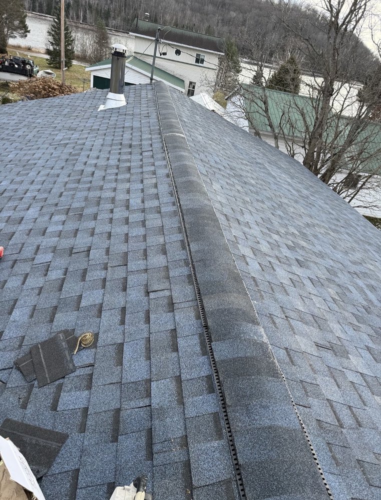 New asphalt shingle roof with ridge vent