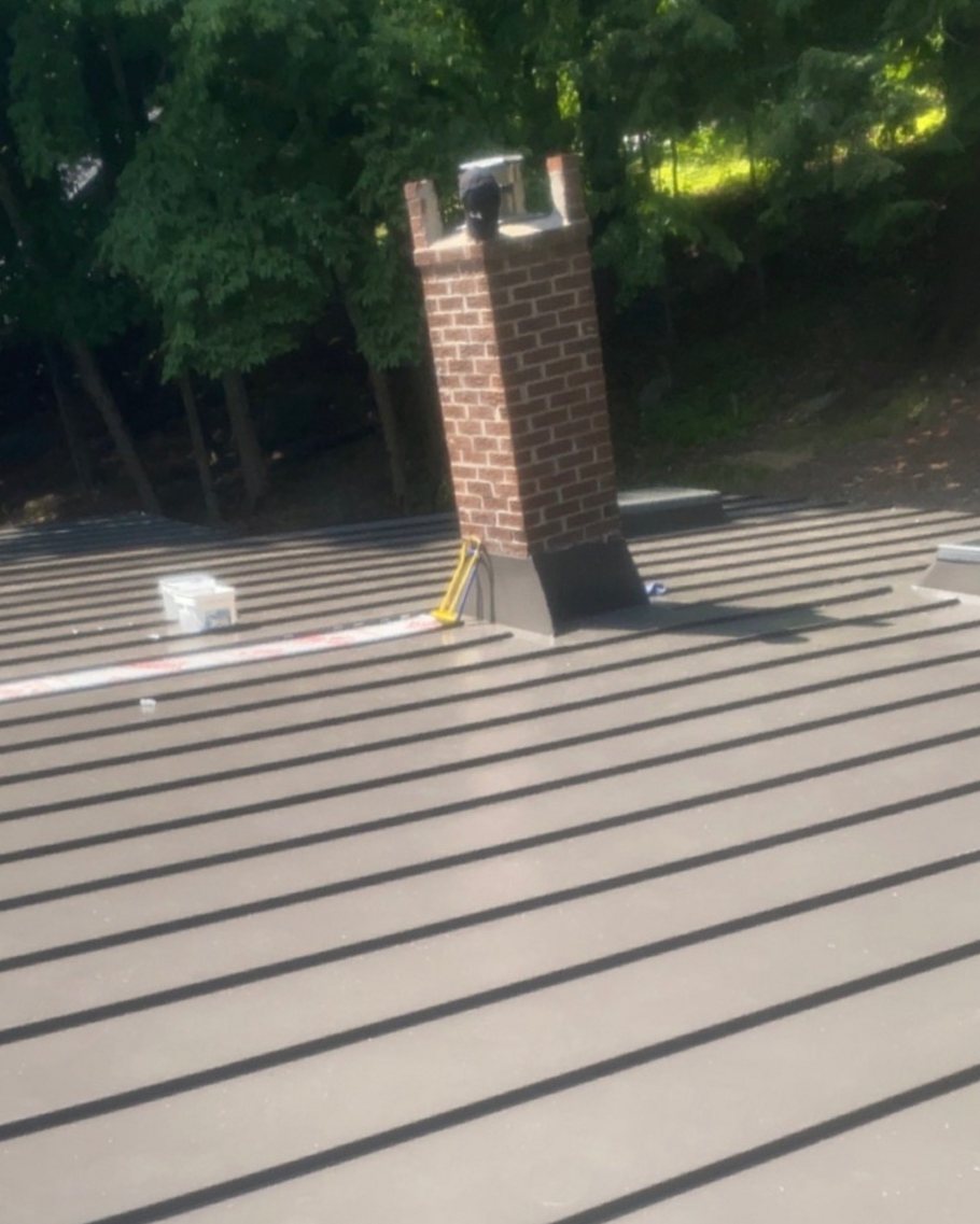 New steel roof, clean panel lines